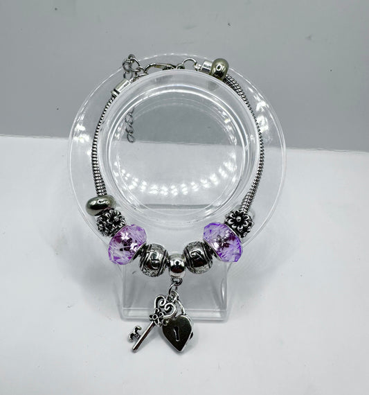 purple charm bracelet